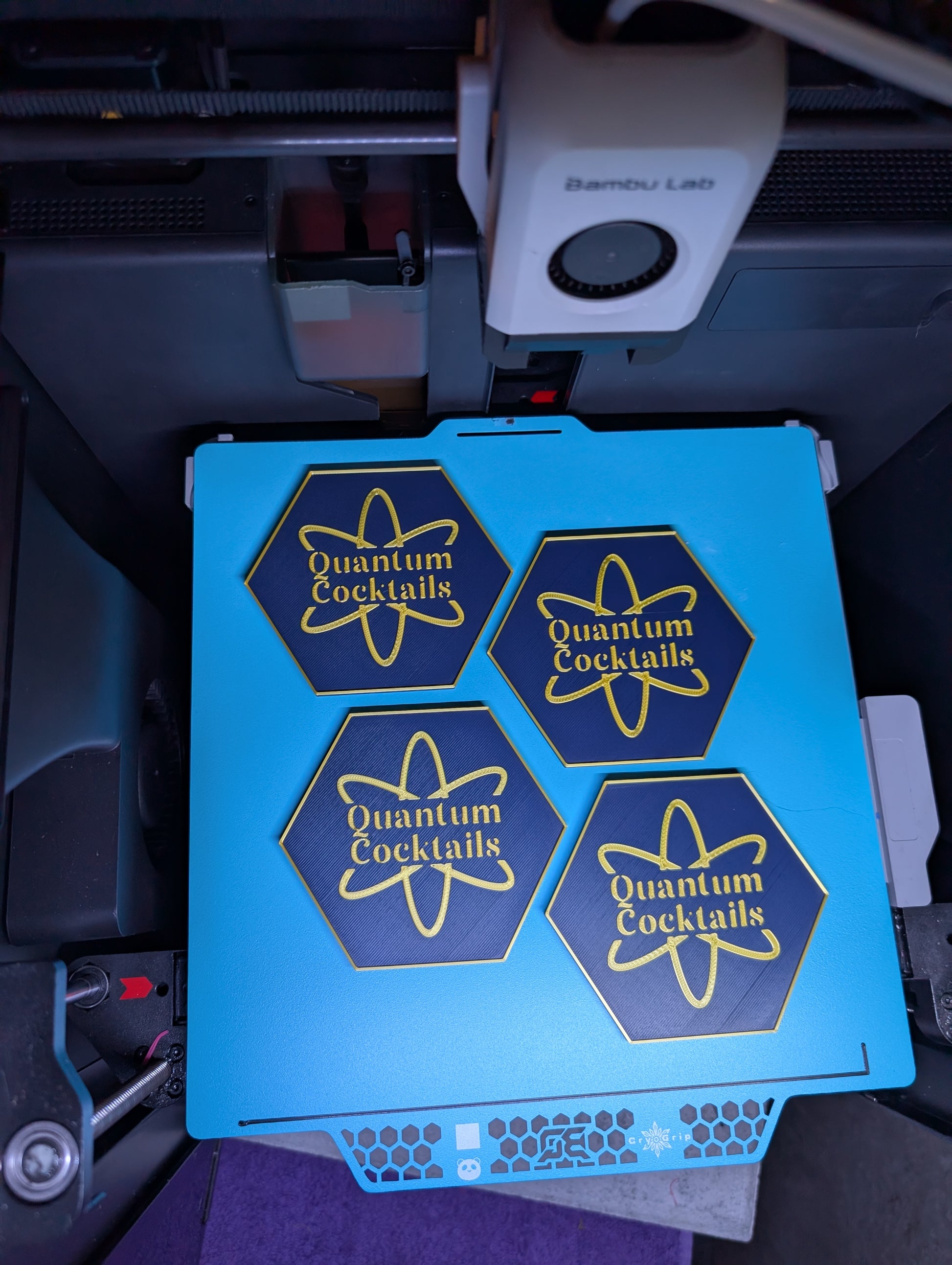 Quantum Cocktails coasters being 3D printed on a Bambu Lab printer
